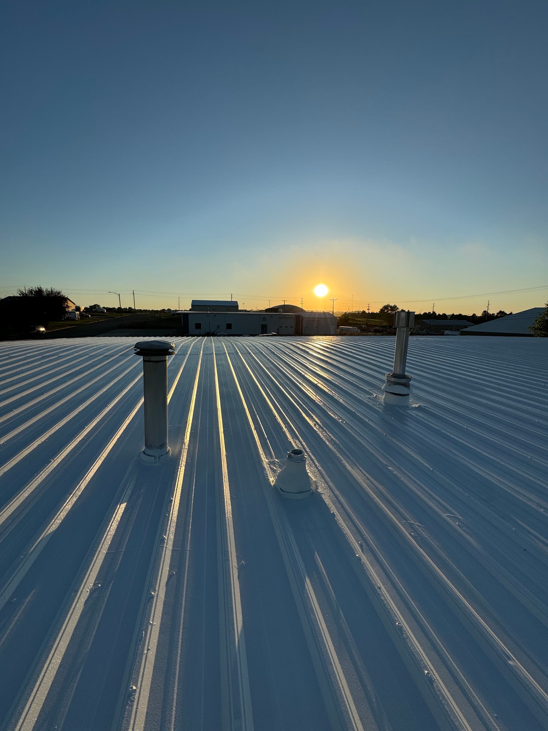 Roof Inspections at Sunset in North Dakota image