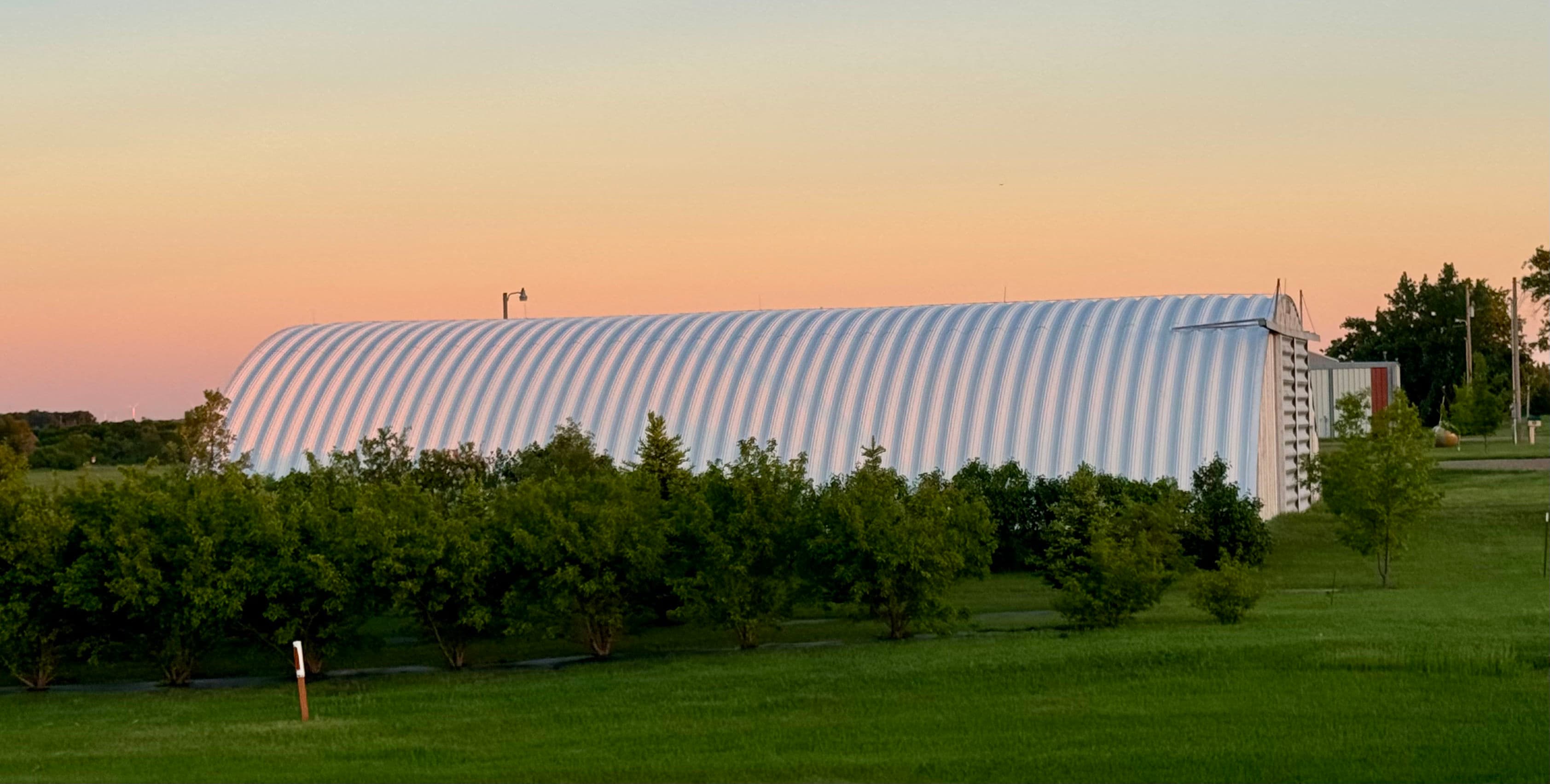 Project Quonset Metal Roof Restoration with Rust-Inhibiting Primer and Fluid Coating image