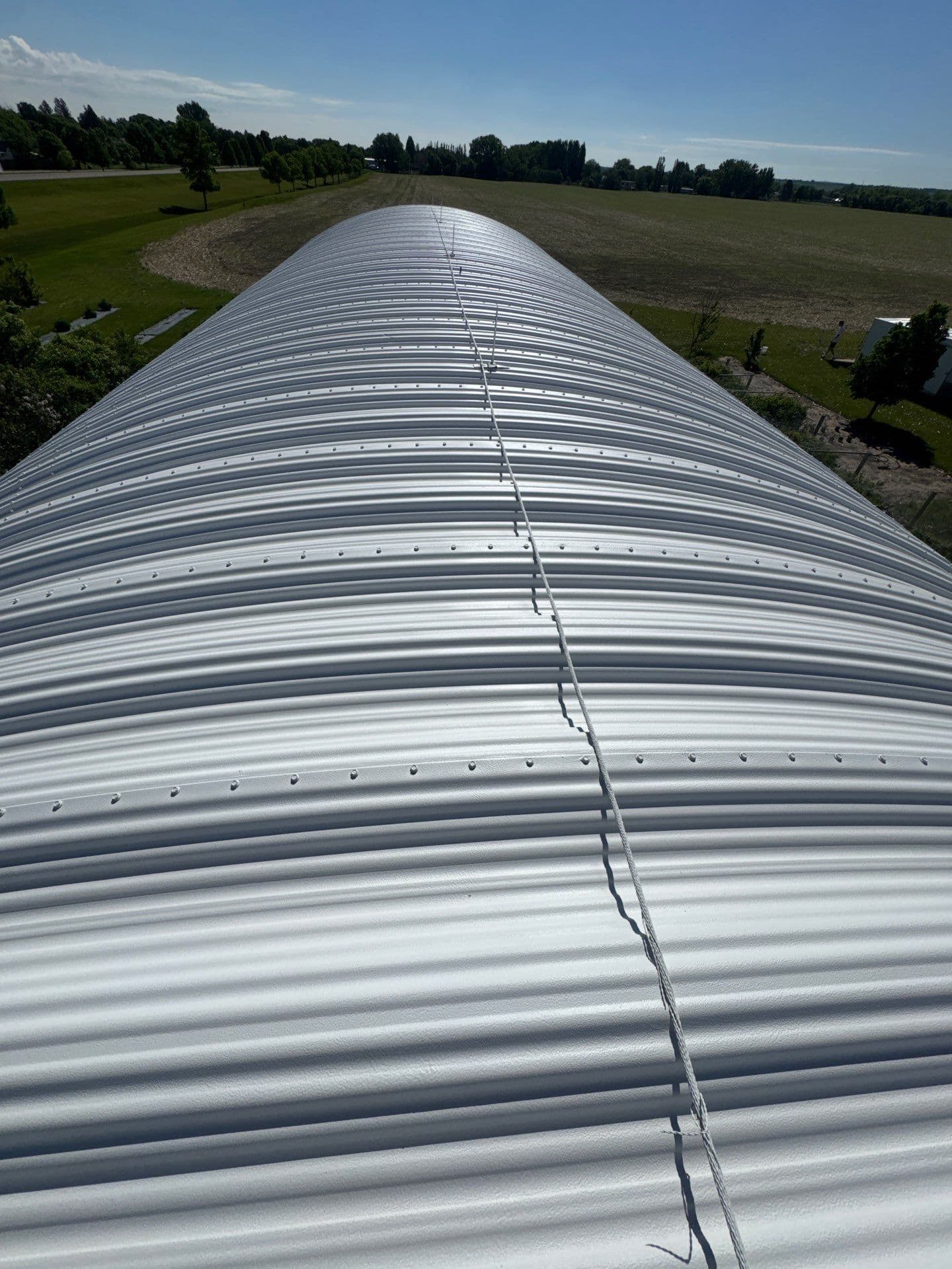 Gallery photos for Quonset Metal Roof Restoration with Rust-Inhibiting Primer and Fluid Coating: Image #3